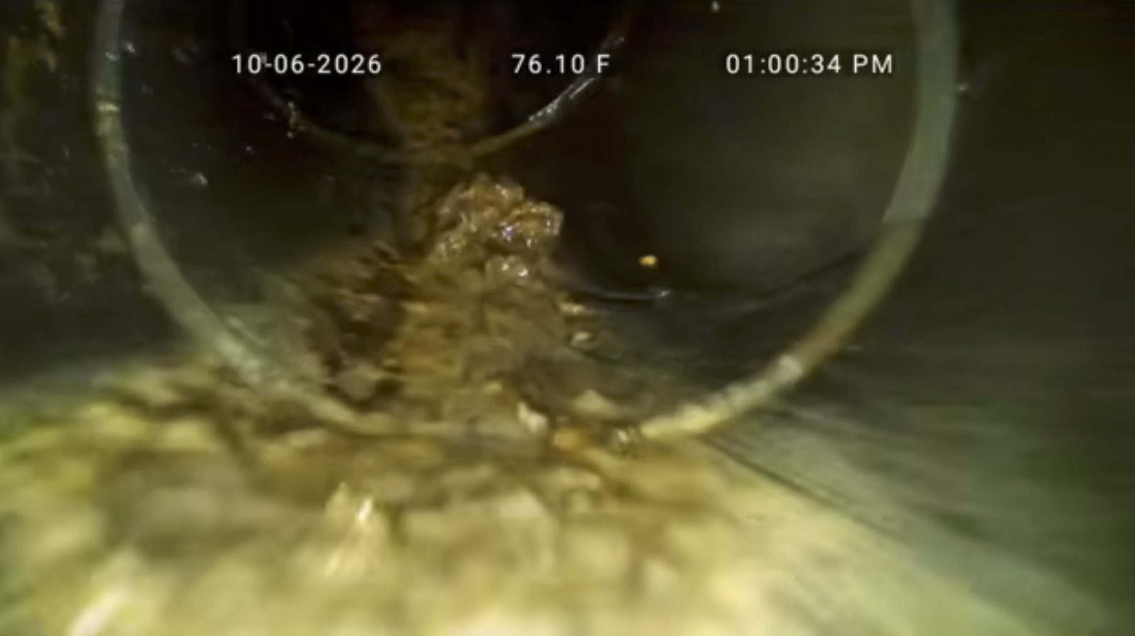 Grease collecting again farther down a main sewer lateral