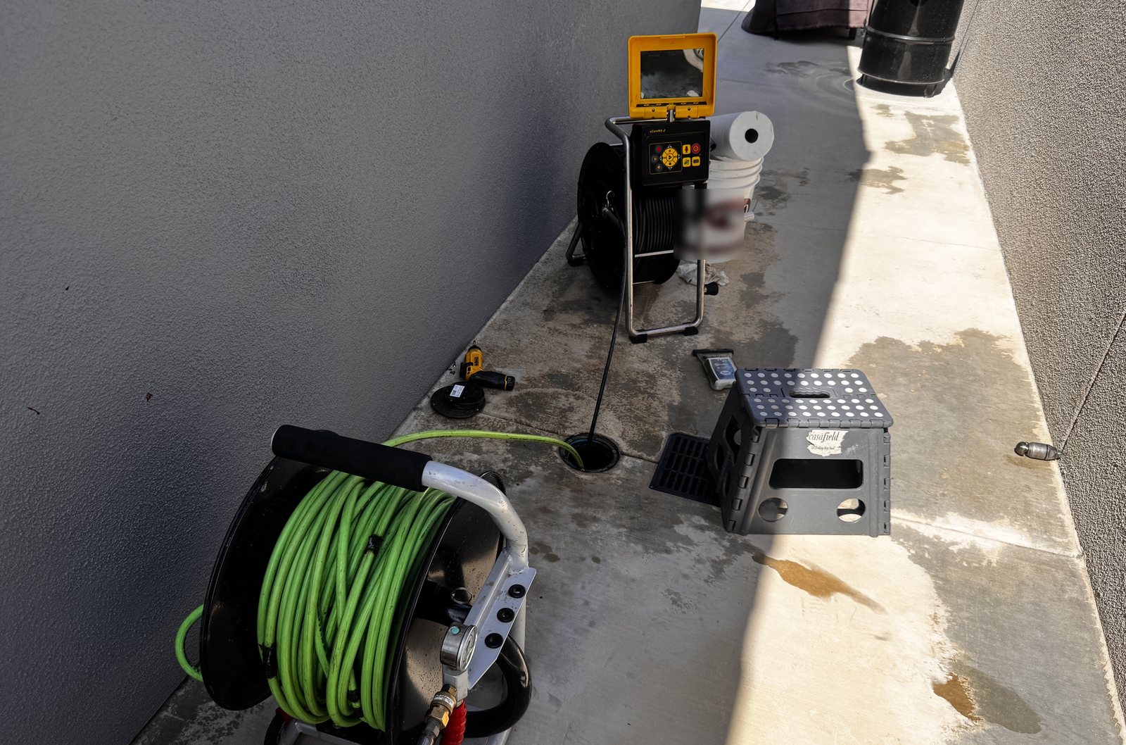 FlowPro OC sewer camera and hydro jetting reel staged at a cleanout access point on a Yorba Linda CA property