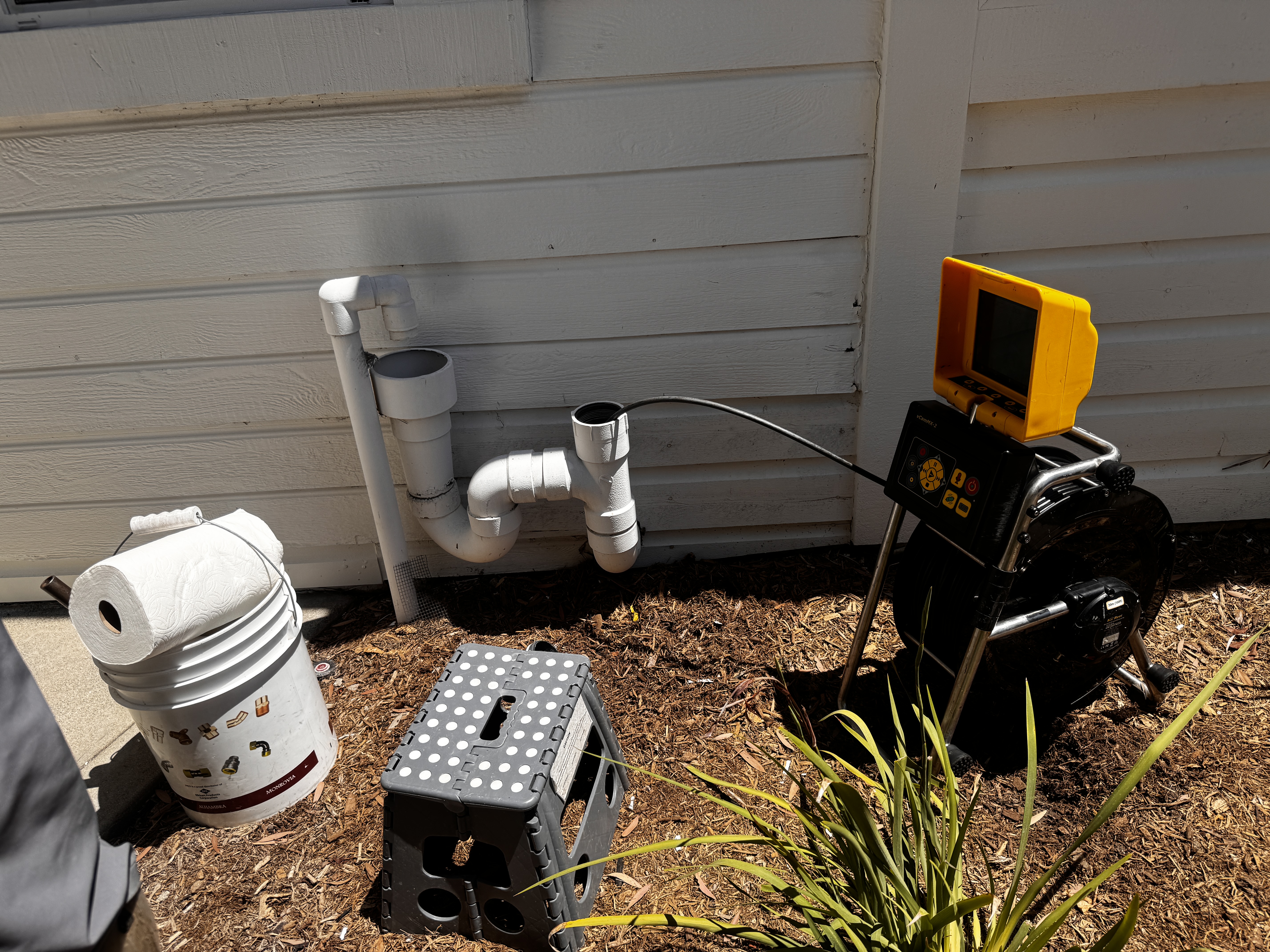 FlowPro OC sewer scope camera setup at Placentia home roof vent access point